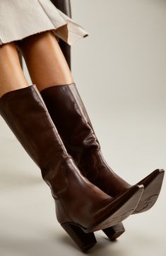 Tonal, Western-inspired stitching accents the slouchy shaft of this boot crafted from soft leather and elevated on a sturdy block heel. Side zip closure Leather upper, lining and sole Imported Tall Dark Brown Boots, Fall Dress And Boots, Fancy Fits, Leather Knee Boots, Aesthetic Outfit Ideas, Shoe Inspo, Brown Leather Boots, Suede Boots, Brown Boots