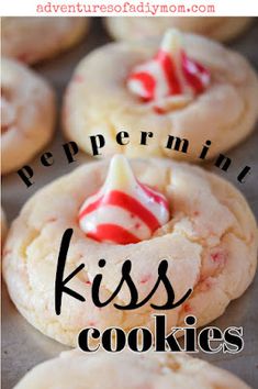 peppermint kiss cookies on a baking sheet with the words peppermint kiss cookies