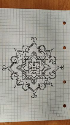 a piece of paper with an intricate design on it