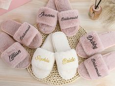 the personalized slippers are laid out on a basket