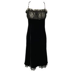 GUY LAROCHE dress comes in a black viscose / silk with a slip liner featuring beaded spaghetti straps, lace panel, and a back zipper closure. Made in France. Very Good Pre-Owned Condition. Marked: F 42 / USA 10 / GB 14 / D 40 Measurements: Bust: 31 inches Waist: 32 inches Hip: 40 inches Length: 33 inches Reference: 121387 Category: Cocktail Dress More Details Brand: GUY LAROCHE Size: 10 Color: Black Fabric: Viscose /silk Material: Velvet Pattern: Mesh Style: Spaghetti Straps Age Group: Adult Gen Velvet Pattern, Guy Laroche, Silk Material, Gianni Versace, Lace Panelled, Black Fabric, Stella Mccartney, Made In France, Day Dresses