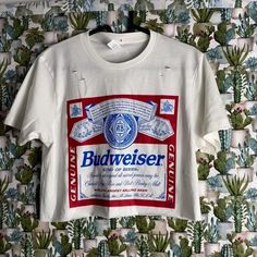 Brand New Distressed Budweiser King Of Beers Graphic Ladies White Crop Top Sm-Xl Makes A Great Gift Quality Brand New Made To Order Crop Tops! 100% Cotton (Small-Medium-Large-Extra Large Available) Fast And Reliable Shipping! Help Support Small Business :) Any Questions Feel Free To Message! Have A Great Day Budweiser Shirt, Budweiser Crop Top, Bud Croptop, Bud Crop Top Bud Light, Ladies Crop Top, Tube Top, Cute Crop Top, Beer Shirt, Beer Crop Top, Gift Shirt, Country Shirt, White Ladies Crop To Beer Crop Top, Crop Top Western, Distressed Crop Top, Budweiser Shirt, Ladies Crop Top, Graphic Crop Top, Cute Crop Top, Country Shirts, Bud Light