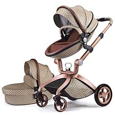 the baby stroller has two wheels and is beige with brown trims on it