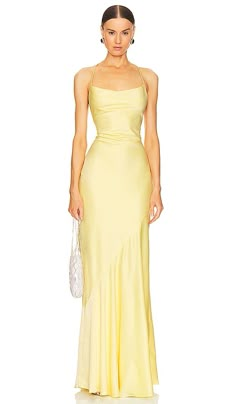 The Nookie Entice Drape Gown features a cowl neck, a sleeveless silhouette, a draped design, and a lace-up tie detail at the back. The gown is fully lined and has a hidden back zipper closure. It is made of a midweight satin fabric and is available in sizes XS to XL. The gown is 97% polyester and 3% spandex. It is made in China and should be hand washed. Pastel Yellow Bridesmaid Dresses, Yellow Formal Dress, Gold Satin Dress, Drape Gown, Yellow Gown, Drape Maxi Dress, Yellow Bridesmaid Dresses, Embellished Gown, Prom Dress Inspiration