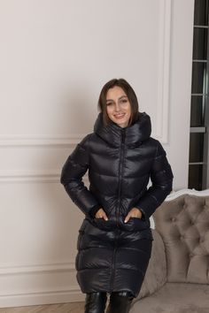 Description: Luxurious midi down jacket delivers a sophisticated winter look with a feminine silhouette and luxury details. Soft satin finish is crafted from ultra sleek, water-repellent Italian fabric. With its modern look down-and-feather insulated channels, the Alaska® 2023-2024 coat is as functional as it is stylish. Product Details: Temperature range: up to -20°C (-4°F) Insulation: 90% white goose down, 10% white feather Shell: water-resistant polyamide/neylon blend fabric Lined for comfort Winter Puffer Coat, Shiny Jacket, Luxury Outerwear, Winter Puffer, Mask Girl, Black Down, Leather Jacket Outfits, Winter Jackets Women, Fabric Belt