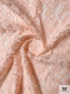 This light peach floral double-scalloped corded lace designer fashion fabric is extremely elegant and high quality. SKU: 12259 Content: Polyester Color: Light Peach Width: 56 inches This fabric is a last cut and no longer in production. Once sold out, we are unable to get more. Elegant Stretch Lace For Spring, Stretch Lace Dress With Scalloped Lace, Spring Scalloped Stretch Lace, Pink Lace With Patchwork For Spring, Pink Lace Patchwork For Spring, Beige Scalloped Lace Dress, Beige Scalloped Lace For Spring, Fashion District, Corded Lace