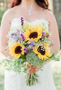 a bride holding a bouquet of sunflowers and broccoli