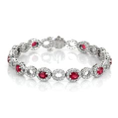 Eleven oval shaped red rubies weighing 4.58 carats on a bracelet.These rubies are from Mozambique and has a mixed brilliant cut and vivid color intenisty.Also featured in the bracelet are 242 round shaped white diamonds weighing 3.26 carats. #braceletfashion #fallbracelets #amazingjewelry #iloveyourbracelet #diyjewelryideas Red Oval Diamond Bracelet, Red Diamond Oval Bracelet, Luxury Red Oval Bracelet, Red Oval Fine Jewelry Tennis Bracelet, Red Diamond Oval Tennis Bracelet, Red Oval Diamond Gemstone Bracelet, Red Oval Tennis Bracelet Fine Jewelry, Elegant Red Oval Bracelets, Elegant Red Oval Diamond Bracelet