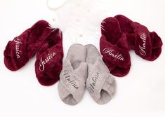 four pairs of personalized slippers with names on them