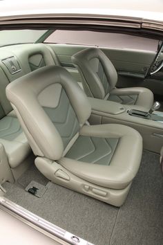 the interior of a car with leather seats