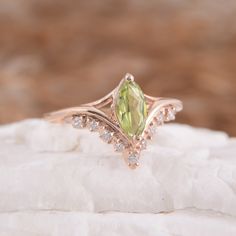 "Antique 14k rose gold marquise cut peridot victorian engagement ring, Vintage art deco peridot promise ring for her, Anniversary gift ring WE OFFER UNLIMITED PERIOD INSTALLMENTS PLAN This is a beautiful, stunning, feminine ring that works well for all occasions, styles, and ages. You will love it! Ring information Main stone: Peridot Approximate size: 8x4mm Accent stones: White cubic zirconia Approximate size: 1.5mm (5 stones) Approximate size: 1.25mm (4 stones) Metal type: Gold Metal stamp: 14 Victorian Engagement Ring, Victorian Engagement Rings, Promise Ring For Her, Sterling Silver Promise Rings, Gold Promise Rings, Engagement Ring Vintage, Fancy Gifts, Dream Engagement, Promise Rings For Her