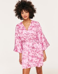 The Izabella Robe is the perfect piece of sleepwear for your romantic moments. Made with soft and luxurious satin this robe features a self-tie closure. (Available in sizes XS-XL.) Feminine V-neck Robe For Sleep, Spring Satin V-neck Robe, Floral Print Satin Sleepwear For Loungewear, Satin Floral Print Sleepwear, Tie Waist Kimono For Loungewear, Feminine Satin Robe For Loungewear, Feminine Floral Print Robe For Loungewear, Satin V-neck Robe For Loungewear, Spring V-neck Sleep Robe