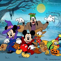 mickey mouse and other disney characters posing in front of a halloween scene with pumpkins