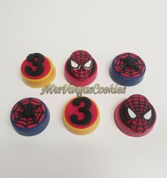 six spiderman cupcakes are arranged in the shape of numbers 3, 4, and 5