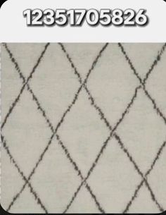 a close up of a rug with black and white lines on it, in the middle of an advertisement