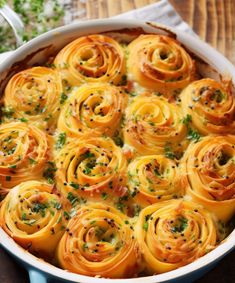 a casserole dish filled with lots of different types of food