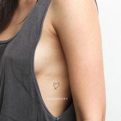 Tiny Minimalist Small Heart Outline Rib Tattoo Ideas for Women - www.MyBodiArt.com #tattoos Tatoos Woman Ribs, Minimalist Rib Tattoos For Women, Small Heart Outline, Limited Edition Tattoo, Rib Tattoo Ideas, Delicate Tattoos For Women, Tattoos On Side Ribs, Mandala Hand Tattoos