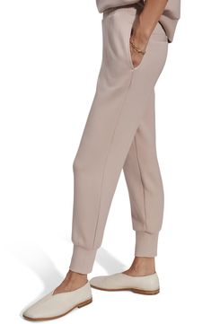 Cut slim from the brand's DoubleSoft fabric, these joggers are detailed with ribbed cuffs and a hidden drawcord to personalize your most comfortable fit. 25 1/2" inseam; 10" leg opening; 11 1/2" front rise; 17" back rise (size Medium) Elastic waist with internal drawcord 72% viscose, 23% polyester, 5% elastane Machine wash, dry flat Imported Athleisure Pants With Elastic Cuffs, Spring Sweatpants With Ribbed Cuffs For Jogging, Tapered Leg Sweatpants With Ribbed Cuffs For Jogging, Jogging Sweatpants With Ribbed Cuffs And Tapered Leg, Athleisure Joggers With Elastic Cuffs And Tapered Leg, Tapered Sweatpants With Ribbed Cuffs For Jogging, Spring Sweatpants With Ribbed Cuffs And Tapered Leg, Tapered Leg Joggers With Elastic Cuffs, Fall Joggers With Ribbed Cuffs And Tapered Leg