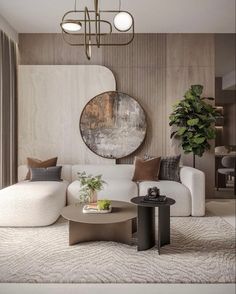 a living room filled with furniture and a round mirror on the wall above it's coffee table