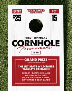 the cornhole tournament flyer is laying on some green grass with red and white lettering