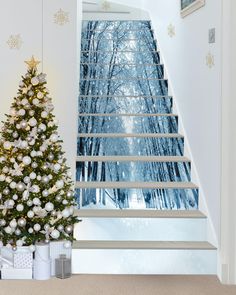 a decorated christmas tree sitting next to a window