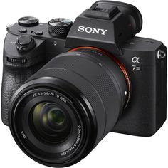 the sony camera is shown with its lens attached to it's front and side