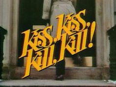 a man standing on top of a set of stairs in front of a building with the words kiss kill