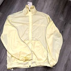 Fabletics Oversized Windbreaker (Light Yellow) This Cinchable, Lightweight Jacket Has An Oversized Fit And Features Reflective Piping. Reflective Silver Piping Fabric: 100% Recycled Nylon Size : Xs (Measurements Are In The Pics) Color: Light Pear/Bright White (Light Yellow) The Stock Photos In The Pink Color Are To Show What It Looks Like On (And I’m Selling The Pink One In Size Small In Another One Of My Listings ) But This Listing Is For The Xs Yellow Jacket. Super Cute, Brand New, Never Worn, Spring Oversized Activewear For Workout, Oversized Spring Athleisure Activewear, Casual Oversized Activewear For Spring, Athleisure Track Jacket With Pockets For Light Sports, Relaxed Fit Athleisure Track Jacket For Spring, Spring Athleisure Outerwear With Relaxed Fit, Solid Color Spring Track Jacket, Spring Stretch Track Jacket With Pockets, Sportswear Track Jacket With Pockets For Workout