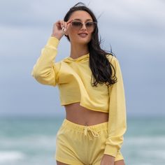 Yellow Long Sleeve Hoodie And Shorts Two Piece Set Street-Ready Look .This Hoodie Features A Drawstring. Shorts Are Super Soft And Also Include A Drawstring. Suit For Casual Wear, Lounge Wear, Workout, Running And Daily Wear. 100% Cotton, Machine Washable Summer Hooded Loungewear Tops, Hooded Top For Summer Loungewear, Summer Loungewear Hoodie With Drawstring Hood, Casual Yellow Sweatshirt For Loungewear, Red Crop Top Hoodie, Black Tie Front Top, High Wasted Shorts, Hooded Long Sleeve Shirt, Black Tube Top