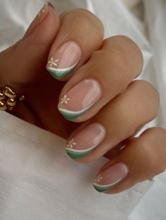 sage green side tips with a simple flower Nude Nails With Green Flowers, Nail Tip Designs Square, Biab French Tips, Spring Nails 2024 French Tip, Fun Green Nail Designs, Summer Nail Tips Ideas, French Biab Nail Designs, Subtle Green Nails, Sage Green Nails With Flowers