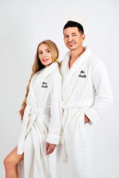 "Mr and Mrs Bathrobes, Matching King and Queen Plush Long bathrobes, Customized bathrobes for Couple, Groom and Bride bathrobes - style1 Bathrobes are selling separately. If you need Set of 2 , please add to your cart 1 Women's and 1 Men's size. Are you getting ready for your honeymoon or anniversary? Stop by here and order your matching couples robes - we will customize them just the way you like it. Whether these are wedding robes or regular his and hers robes, they are so high-quality, that a Matching Robes Couple, White Long Sleeve Bath Robe, White Long Sleeve Bathrobe, White Long Sleeve Home Robe, White Long Sleeve Sleepwear For Honeymoon, Personalized Bathrobe, Groom And Bride, Wedding Robes, Custom Robes