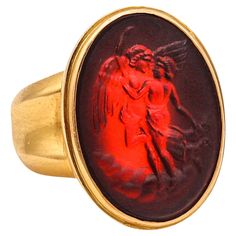 Signet ring with carnelian. Gorgeous statement signet ring, crafted in Europe in solid yellow gold of 18 karats with high polished finish. Designed in the ancient style with very bold look and exhibiting great eye appeal. The craftsmanship is impeccable with great attention to the details and the finishes. Gemstones: Mount on top in a bezel setting, with 1 oval flat cabochon cut carved from natural translucent carnelian. Birthstone: Carnelian for the month of July. Weight: 22.60 Grams, (14.49 Dw Bezel Set Cabochon, Gents Ring, Month Of July, Carnelian Stone, Gold Signet Ring, 18k Gold Ring, Gems And Minerals, Cocktail Ring, Solid Yellow