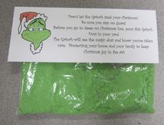 a green bag with a grino face on it and a poem written in the front