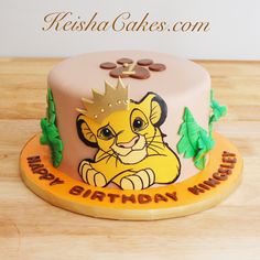 a birthday cake with a lion on it