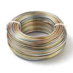 a coil of multicolored wire on a white background