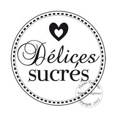 a black and white logo with the words delices sucres