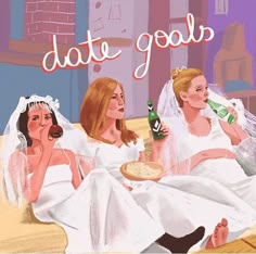 two women in wedding dresses sitting on a couch and one is holding a bottle of beer