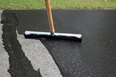 a street sweeper is laying on the asphalt