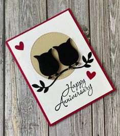 an anniversary card with two birds on it