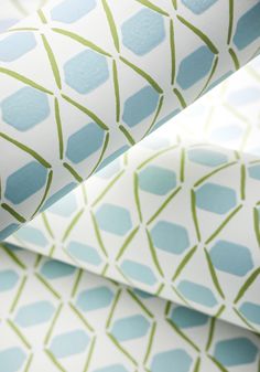 blue and green wallpaper with geometric shapes