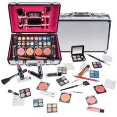 Portable, durable, reusable Aluminum train case Eyeshadows, Face Powders, Blushes, Lipsticks, and more FREE Aluminum Makeup case Great gift idea for Makeup Beginners & Enthusiasts Designed & Manufactured in U.S Not Tested on Animals Perfect for recitals, theater and other performances. Will not irritate skin like many cheap make up sets. The SHANY Carry All Makeup Train Case is a durable and portable aluminum makeup train case that comes with a variety of stylish / high quality makeup that best fits your on-the-go lifestyle. This case comes with: eight shadow quads in shimmer and matte shades, three dual sided eyeshadow sponges, two blushes, one blush brush, one portable blush brush, four full sized lipsticks (two matte and two shimmer), one dual-sided lip liner (red and pink), one dual-si Makeup Storage Organization, Makeup Train Case, Makeup Training, Makeup For Teens, Train Case, Eye Shadows, Makeup Gift, Makeup For Beginners, It Cosmetics Brushes