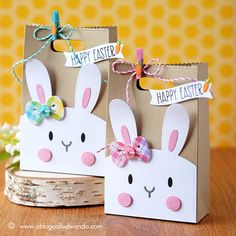 two paper bags with bunny ears on them