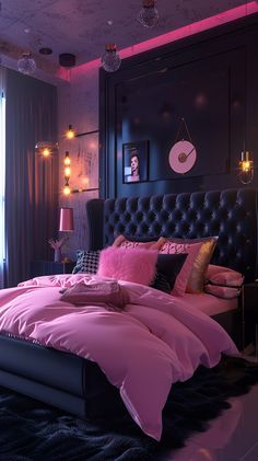 a bed with pink sheets and pillows in a dark room next to a large window