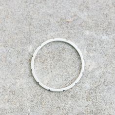 This stacking ring is a beautiful addition to your stacking set. It will bring ethnic and natural spirits to your look.The ring is made of sterling silver. It is 1 mm thick. You see the ring of the 5.5 size in the pictures. You may order the ring of any size. If you are not sure about the size, this will be helpful: findmyringsize.com/If you want to buy the ring as a gift and you don't know the precise size, you may also choose a standard size: Small (UK- M, USA - 6) Medium (UK - P, USA - 7,5) L Stackable White Gold Bands, Stackable White Gold Bands Open Ring, Stackable White Gold Open Ring Bands, Stackable White Sterling Silver Eternity Band, White Sterling Silver Stackable Eternity Band, Everyday Stackable White Gold Bands, White Gold Stackable Open Midi Rings, Silver Minimalist Stackable Jewelry, Stackable Sterling Silver Eternity Band For Promise