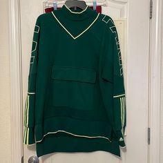 Used Twice - Gender Neutral - This Turtleneck Adidas X Ivy Park Cargo Sweatshirt Was Released Alongside 88 Other Items As A Part Of The Two Brands' Second Collaborative Release Of 2020. The Sweatshirt Itself Is Made Of A 100% Cotton French Terry Material With A Ribbed Cotton Turtleneck And Features A Slightly Oversized Fit. A Large Cargo Pocket Can Be Found Front And Center At On The Sweatshirt That Also Features Ivy Park Branding On The Shoulders And Adidas Branding On The Sleeves. This Ivy Park X Adidas Cargo Sweatshirt Was Made Available At The Retail Price Of $100 Usd On October 29th, 2020. Adidas Cargo, Adidas X Ivy Park, Cotton Turtleneck, Adidas Branding, Adidas Sweater, Ivy Park, Adidas X, Cargo Pocket, Colorful Sweaters