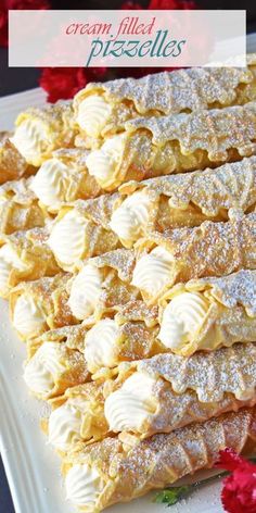 cream filled pretzels on a white plate with red flowers