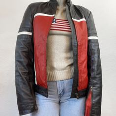 Rev up your style with a vintage motorcycle jacket from Highway Ave, your premier destination for timeless fashion. This iconic piece of history is $160. Our online vintage thrift store offers you the chance to embrace the rugged charm of yesteryears while making a bold statement in the present. Crafted with genuine leather, this jacket exudes character and durability, a testament to its enduring style. Don't let this vintage motorcycle jacket escape your grasp. Retro Leather Biker Jacket For Spring, Retro Fitted Biker Jacket With Long Sleeves, Retro Fitted Long Sleeve Biker Jacket, Retro Fitted Leather Jacket For Winter, Retro Long Sleeve Leather Jacket For Work, Fitted Patchwork Leather Jacket, Retro Fitted Biker Jacket For Spring, Retro Fitted Biker Jacket For Fall, Fitted Leather Jacket With Patchwork