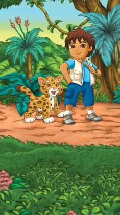 a boy standing next to a cat in the jungle