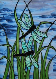 a painting of dragonflies sitting on top of green grass next to the water with blue sky and clouds in the background