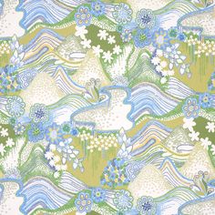 a green and blue fabric with flowers on it